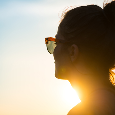 Lady looking toward sun
